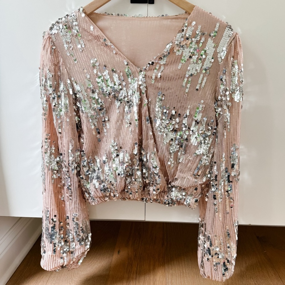 Peach colored sequin blouse with silver sequins